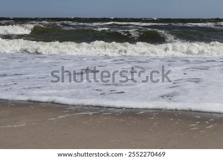 Similar – Image, Stock Photo Foamy waves rolling up in ocean