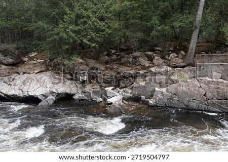 dynamic currents carving through the rocky heart of the valley  in the Parc Des Chutes Dorwin - Rawdon