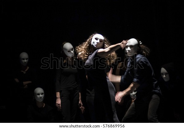 dynamic dance drama on stage in theater- theater group\
on stage 