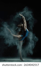 Dynamic dance performance with smoke effect showcasing athleticism and grace