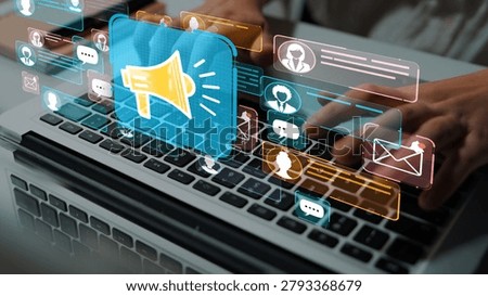 Dynamic Digital Marketing Concept Featuring Megaphone Icon with Social Media Notifications on Laptop Keyboard. Entropy.