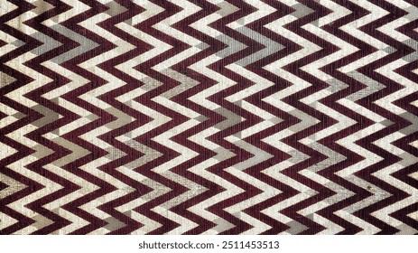 A dynamic geometric zig-zag pattern with bold, symmetrical lines, combining bright and contrasting colors to create an eye-catching and modern visual effect. Perfect for backgrounds, graphic design