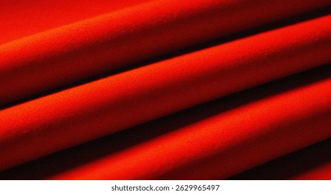 Dynamic gradient background of abstract red fabric capturing light and color in a grainy texture ideal for modern design projects environments and artistic concepts