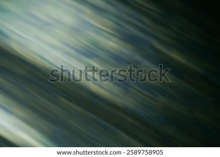 Dynamic Green Light Motion with Blurred Gradient Effect for a Dreamy Background