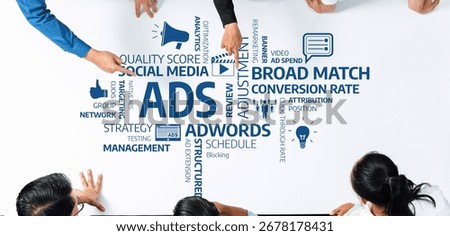 A dynamic group engages in a strategy session focusing on digital advertising techniques, emphasizing quality scores, social media effectiveness, and adjustment strategies. Amity