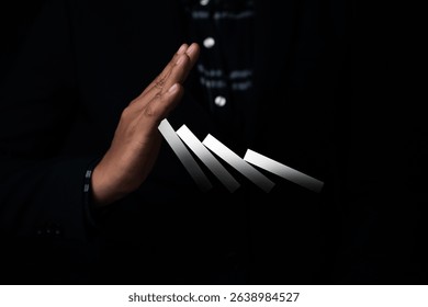 Dynamic hand gesture performance studio photography dark environment close-up view creative expression
