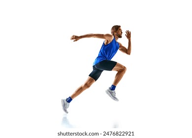 Dynamic image of man in a run, runner in motion, training isolated on white studio background. Speed and endurance. Concept of sport, marathon, competition, healthy and active lifestyle - Powered by Shutterstock