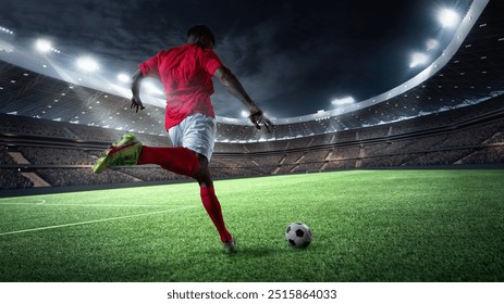 Dynamic image of man, soccer player in red uniform, kicking ball on well lit stadium field at night. Energy and focus. 3D render of stadium. Concept of sport, competition, tournament, games, event - Powered by Shutterstock