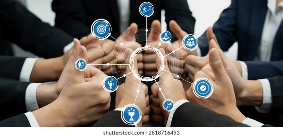 A dynamic image showcasing a group of professionals giving thumbs up, symbolizing collaboration and success, with digital icons representing goals and achievements around them. Amity