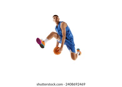 Dynamic image of young man, basketball player in motion, jumping with ball, scoring winning goal isolated over white background. Concept of sport, competition, match, championship, health, action. Ad - Powered by Shutterstock