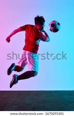 Dynamic mid-air soccer header with focused determination. Concept of competitive sports, team spirit, decisive moments, and professional athletic performance.