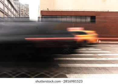 A dynamic motion blur shot capturing a fast vehicle speeding through an urban city intersection, conveying an energetic and cinematic metropolitan atmosphere.
