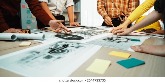 A dynamic planning session taking place in a modern office, featuring collaboration among diverse professionals analyzing blueprints, documents, and visual aids on a table. SACTR