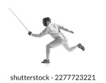 Dynamic portrait of male athlete in fencing costume with sword in hand in action isolated on white studio background. Concept of sport, competition, professional skills, achievements.