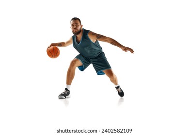 Dynamic portrait of professional basketball player, fit man honing skills with precision dribbling against white background. Concept of sport, hobby, active lifestyle, power and strength. Copy space. - Powered by Shutterstock