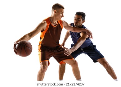 Dynamic portrait of two men, professional basketball player training isolated over white studio background. Possession of the ball. Concept of sport, action, team game, active lifestyle - Shutterstock ID 2172174237