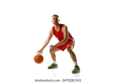 Dynamic portrait of young athlete man, professional basketball player ready to score goal against white studio background. Concept of professional sport, games, healthy lifestyle, tournament, action. - Powered by Shutterstock