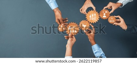 A dynamic representation of teamwork in a business environment, showcasing diverse hands interacting with gears that symbolize collaboration and strategic planning efforts. Amity