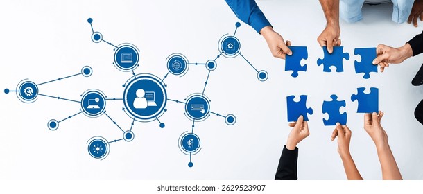 A dynamic representation of teamwork, featuring hands assembling puzzle pieces against a backdrop of digital connection icons, symbolizing innovation, collaboration, and problem-solving. Amity