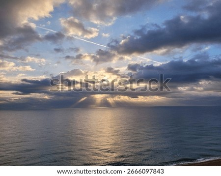 Dynamic sky beautiful clouds with rays of light in blanes Costa brava catalunya Spain 