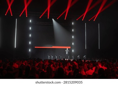 Dynamic speaker captivating an audience, making it ideal for conference highlights.