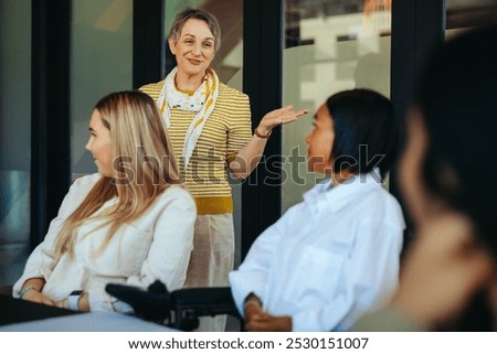 A dynamic teacher interacting with a small class, creating a positive and inclusive learning atmosphere with attentive and diverse students.