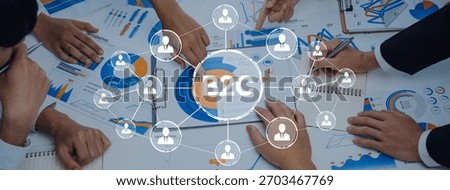 A dynamic team collaborates during a B2C market analysis session, engaging with various charts and graphs to explore growth opportunities and improve strategies. Trope