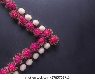 A dynamic, top-down chevron layout alternating between whole, spiky neon-pink rambutan shells and completely peeled, glassy-white fruit spheres. The sharp contrast between the aggressive, hair-like exterior texture and the hyper-smooth interior flesh delivers immense tactile depth.