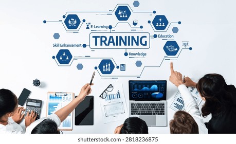 A dynamic training session showcasing e-learning methods and skill enhancement strategies, emphasizing teamwork and effective knowledge sharing in a modern workplace setting. Amity