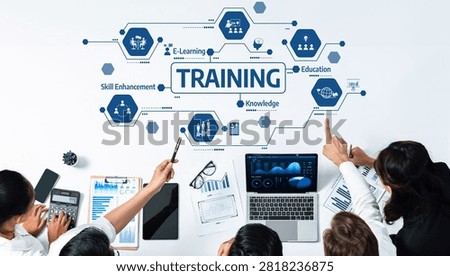 A dynamic training session showcasing e-learning methods and skill enhancement strategies, emphasizing teamwork and effective knowledge sharing in a modern workplace setting. Amity