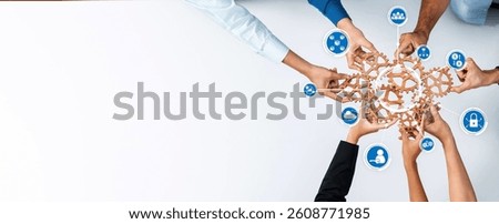 A dynamic visual representation of diverse hands collaborating to assemble a chain of interactive business icons, showcasing teamwork and innovative communication strategies. Amity