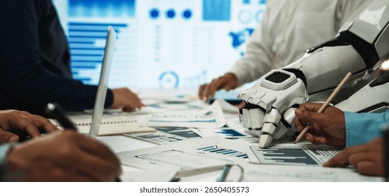 A dynamic workspace showcasing collaboration between humans and robots, focusing on data analysis. Charts and technology tools create an innovative atmosphere for teamwork.Noogenesis