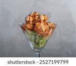 dynamite prawn garnished with lettuce