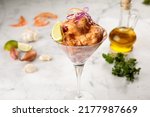 DYNAMITE SHRIMP served in a goblet isolated on wooden table background side view of appetizer
