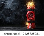 Dynamite time bomb with burning wires on black wooden table, space for text