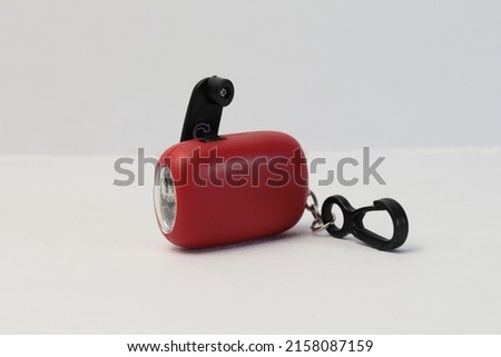 Dynamo flashlight. Compact, ideal for backpacks, gear bag for glove compartments. Just wind handle to charge, no battery to replace. 
