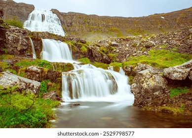 Dynjandi is one the most famous waterfall of the West Fjords during summer, Iceland, amazing view - Powered by Shutterstock