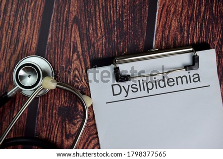 Dyslipidemia text write on a paperwork isolated on office desk. Healthcare/Medical concept