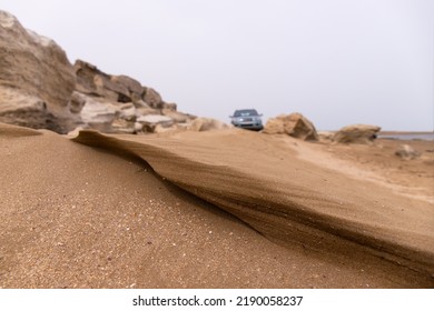 Dyubyanda. Azerbaijan. 03.17.2021.  Car On A Beautiful Beach By The Sea.