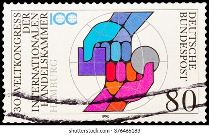 DZERZHINSK, RUSSIA - FEBRUARY 04, 2016: A Postage Stamp Of GERMANY Shows Two Arms, International Chamber Of Commerce, 30th Universal Congress, Circa 1990