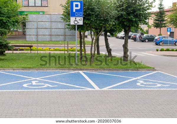 Dzialoszyn, Poland - 07.25.2021 - parking\
space for disabled people in\
Działoszyn