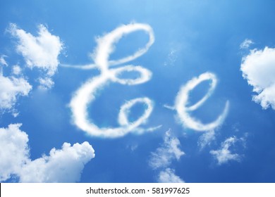 E clouds font calligraphy style ,hand written on sky background. 