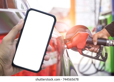 E Wallet Concept, White Screen Smartphone On Hand And Car Fuels Concept, Oil Station Hand And Fuel Nozzle In Car, Spending Via The Internet