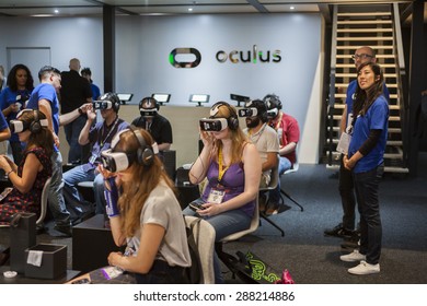 E3; The Electronic Entertainment Expo At The Los Angeles Convention Center, June 16, 2015. Los Angeles, California. A Group Of Women Experience Virtual Reality At The Oculus Booth At E3..