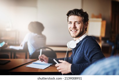 Eager To Be Learning And Earning A Tertiary Education. Cropped Shot Of University Students In Class.