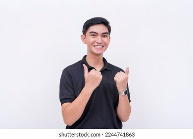 A eager young man gives two thumbs up. A well dressed guy in his early 20s giving approval. Isolated on a white background. - Powered by Shutterstock