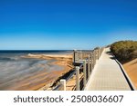 Eagle Bluff Boardwalk and viewing platform above the shallow waters of Henri Freycinet Harbour, Shark Bay, Denham, Western Australia. A good place to see sharks, rays and turtles.
