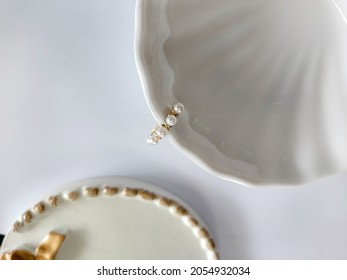 Ear Cuff Adorned With Pearl. Color Is Gold.