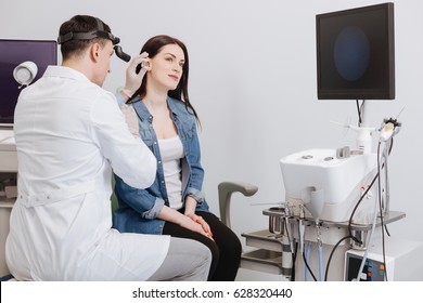 Ear Nose Throat Doctor Wearing Headlight