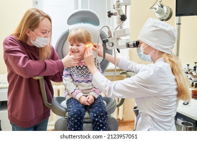 Ear, Nose, Throat Examining. Doctor With A Child And Endoscope. Otolaryngology